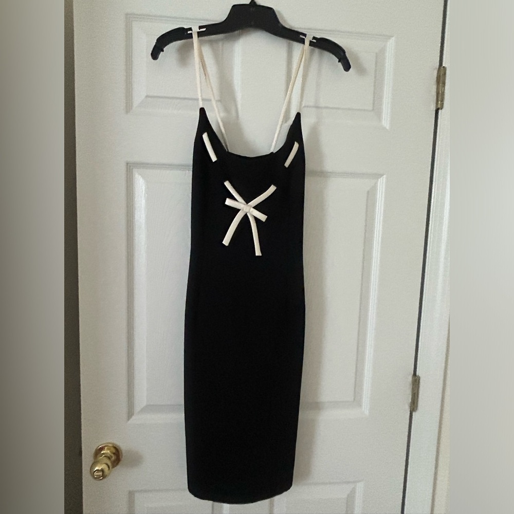 Maggy London, black with cream bow detail.